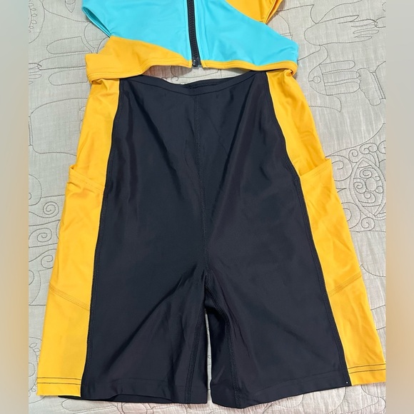 NWT Outdoor Voices SplashKnit 6" Bodysuit XS Colorblock Black, Teal, and Yellow - Picture 10 of 12